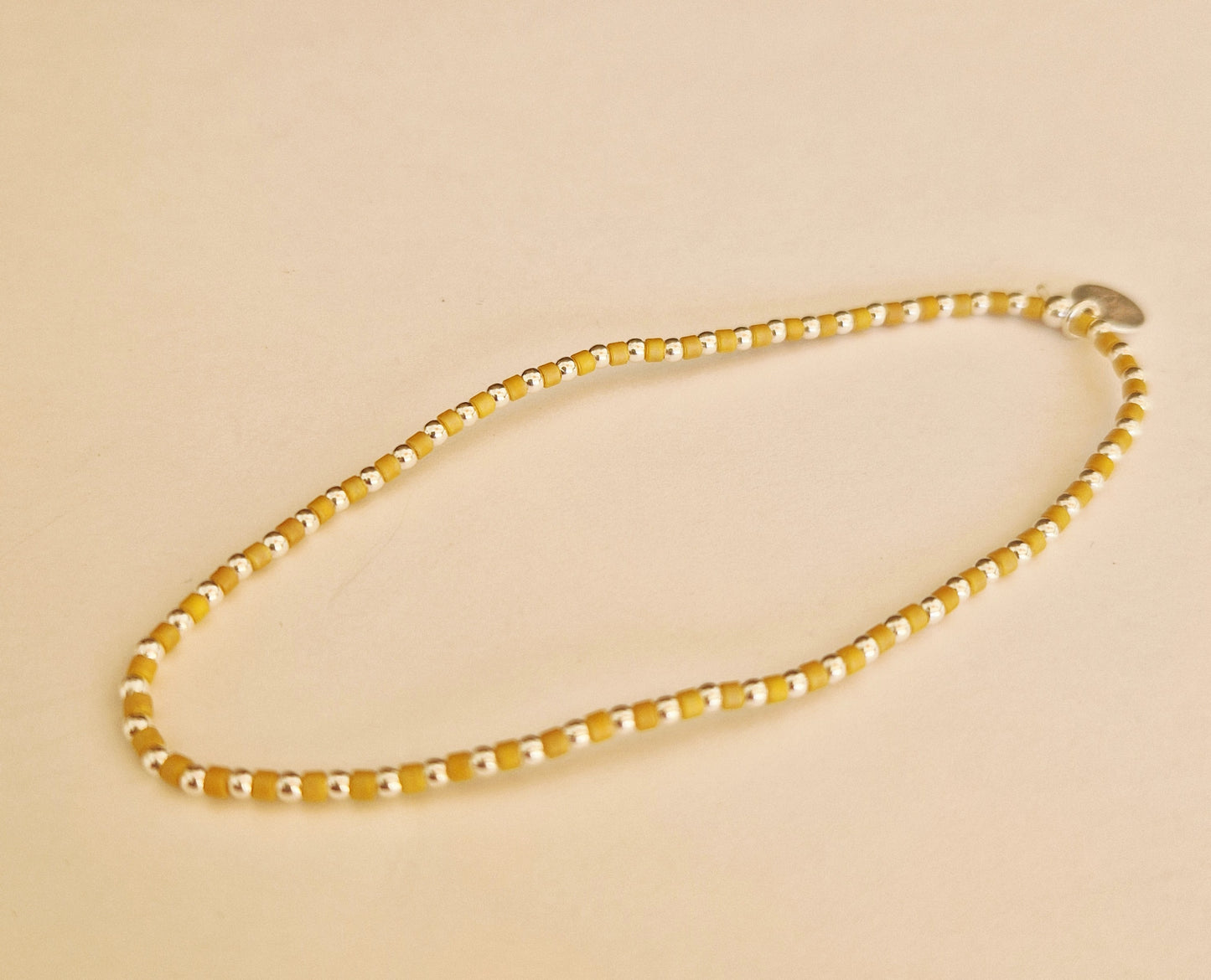 Le bracelet 1,8 argent et perles Miyuki