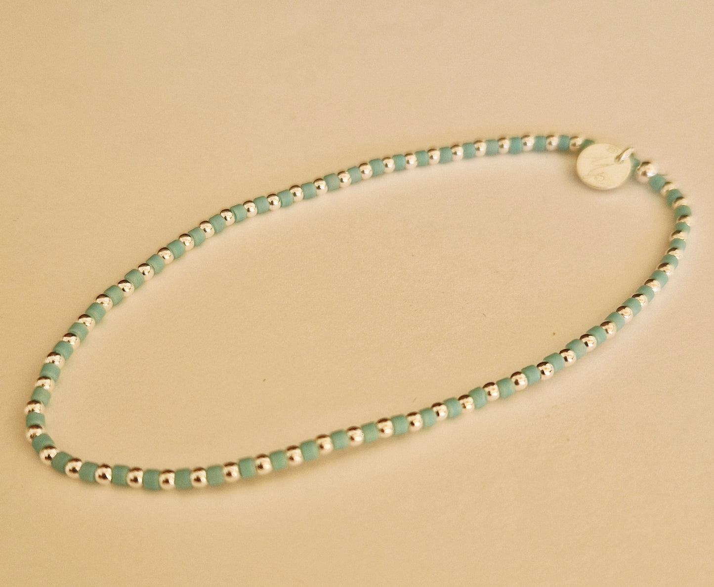 Le bracelet 1,8 argent et perles Miyuki