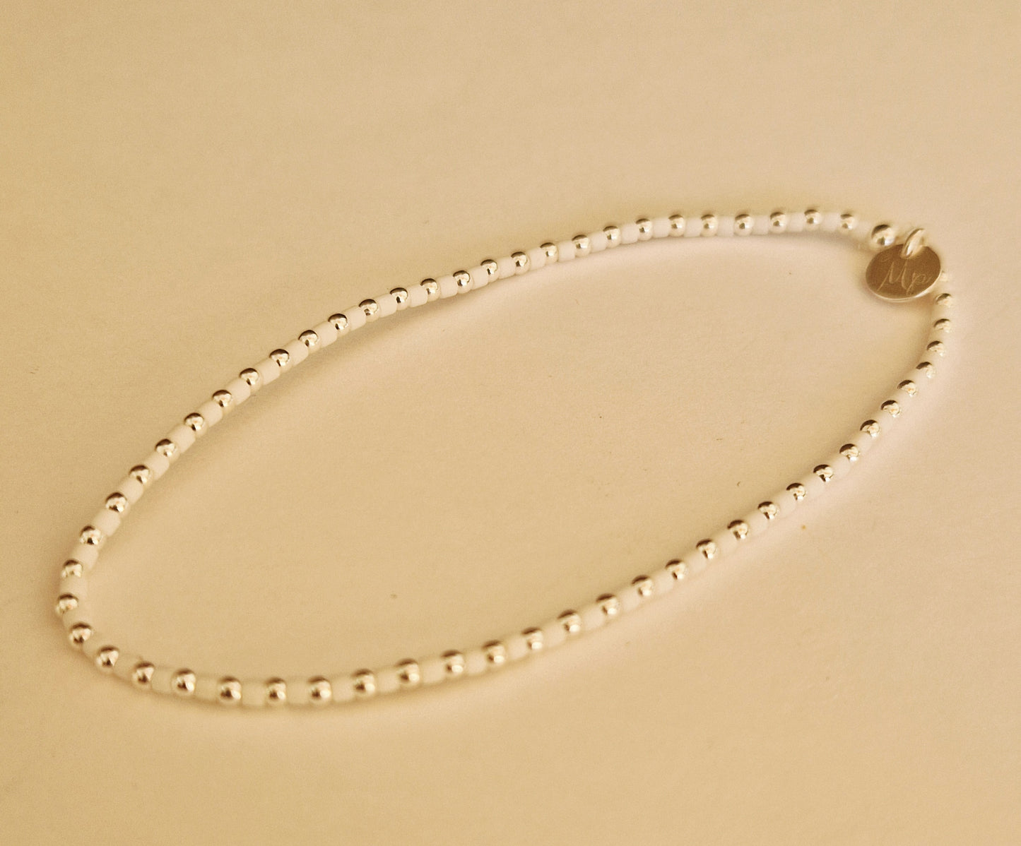 Le bracelet 1,8 argent et perles Miyuki