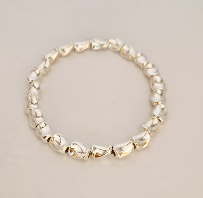 Bracelet en perles en argent torsadées