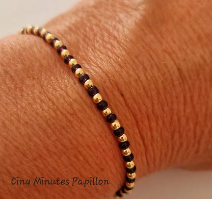 Bracelet en perles de rocaille et perles plaquées or