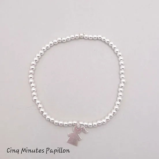 Bracelet en perles argent et breloque "fille"