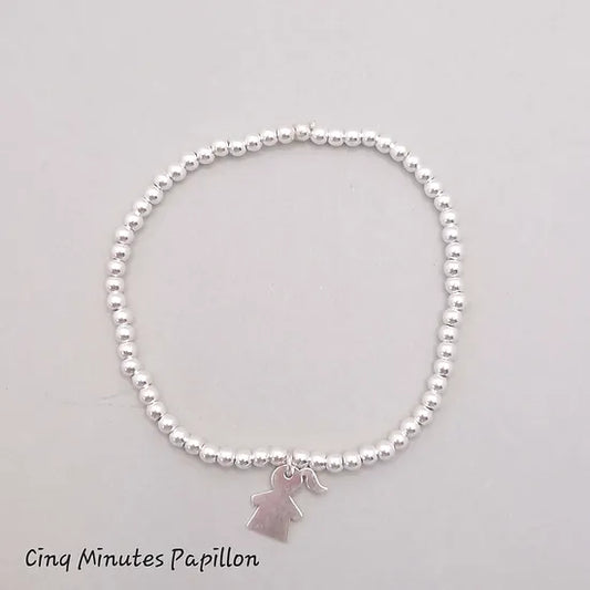 Bracelet en perles argent et breloque "fille"