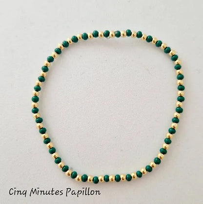 Bracelet en perles de rocaille et perles plaquées or