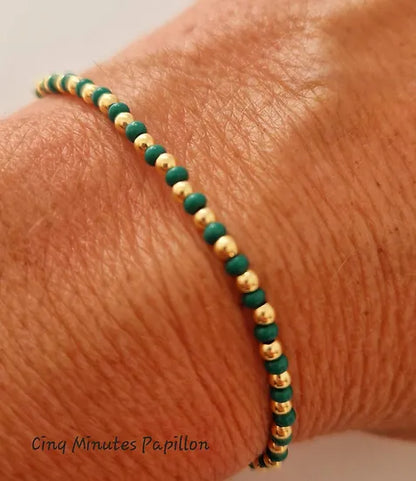 Bracelet en perles de rocaille et perles plaquées or