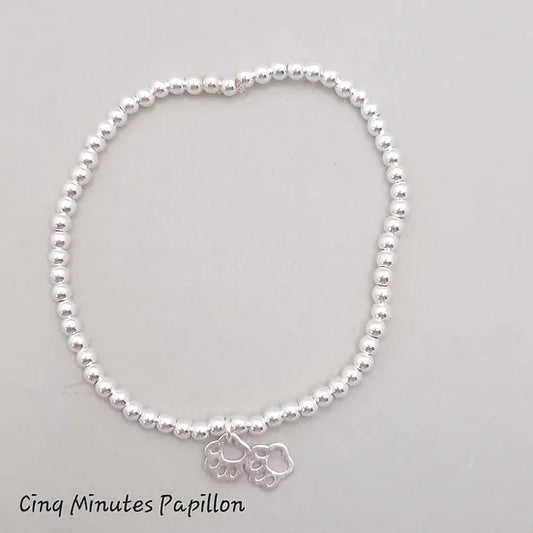 Bracelet en perles argent et breloque patte