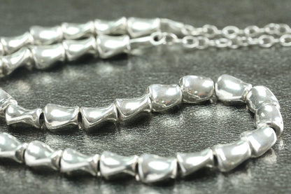 Collier en perles torsadées